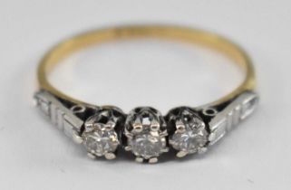 An 18ct yellow gold three stone diamond ring, diamonds totalling approx 0.3ct, size L, approx 1.6g.
