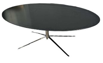 FLORENCE KNOLL (1917-2019); a modern contemporary oval dining table on chrome base with black