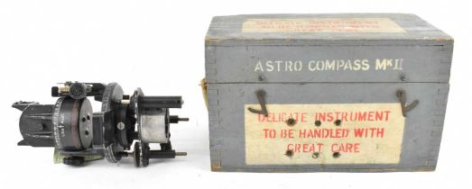 A cased A. M. Astro Compass MKII, with remnants of Royal Airforce paper label and with hand