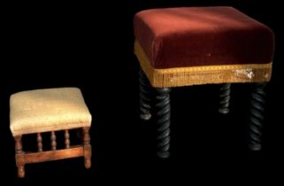 An early 20th century red upholstered footstool on barley twist supports and a smaller Edwardian