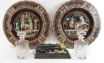 Two cut glass decanters, including a Warwickshire Cricket Club and an England v Wales at