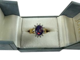 An 18ct yellow gold opal and diamond set cluster ring, size R/S, approx 7.2g.