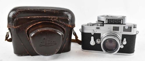 A Leica-Meter MC Red Dot camera, with Ernst Leitz GmbH Wetzlar lens, in original leather case.