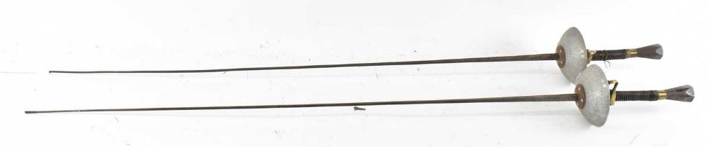 PRIEUR PARIS; a pair of French fencing epees, indistinctly marked 'BTE.S.G.D.G'.
