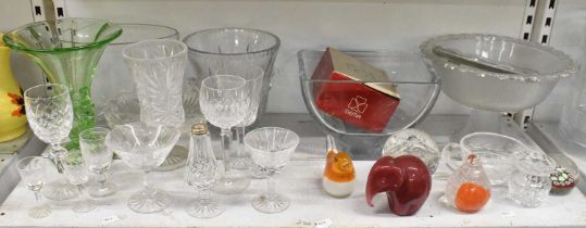 A quantity of cut and crystal glassware including bowls, vases, paperweights, wine glasses, etc.