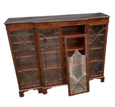 A reproduction mahogany four door display cabinet, width 145cm (af). Condition Report: Please note