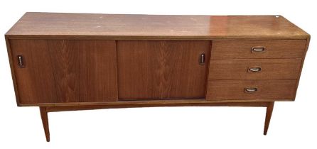 F AUSTIN (LEYTON) LTD OF LONDON; a teak mid century sideboard, width 183cm.