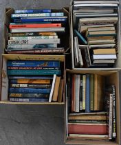 A large quantity of books relating to cars, planes, railways and boats, contained in four boxes.