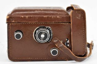 A Rolleicord K3 leather cased camera.