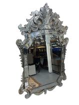 A large Venetian style wall mirror (af), height 195cm, width 120cm. Condition Report: Please note, a