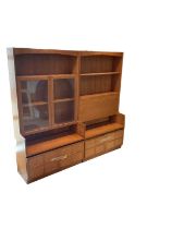 Two teak mid century wall units, one with pair of glazed doors and one with fall front cupboard