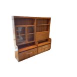 Two teak mid century wall units, one with pair of glazed doors and one with fall front cupboard
