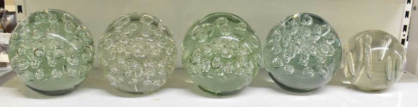 A set of seven large glass paperweights, with three smaller similar paperweights (10).