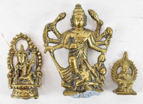 A small Indian gilt bronze figure of Shiva, height 10cm, and two smaller Indian gilt bronze