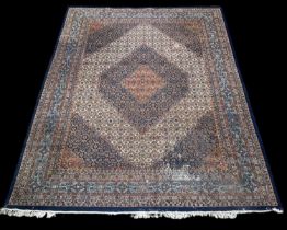 A large Persian rug with geometric design, 400 x 300cm