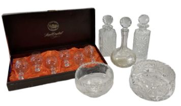 WEBB CRYSTAL; a cased set of six crystal wine glasses, a pair of cut glass decanters, a further