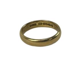 A 22ct yellow gold wedding band, size O/P, approx 6.1g.