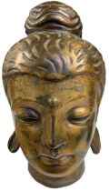 A modern bronze model of Buddha's head, height 29cm.