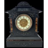 A Victorian slate mantel clock with white enamel dial, height 35cm.