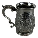 A George III hallmarked silver mug with floral decoration, London 1827, rubbed maker's mark,