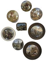 A group of seven pot lids and a glass gilt metal mounted trinket box with a print of the Hotel de