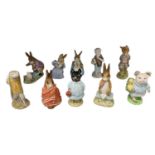 BESWICK; a group of ten Beatrix Potter figures including 'Sir Isaac Newton', 'Poorly Peter