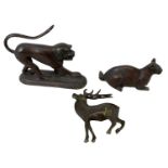 A group of three bronze models of animals including a monkey, a cat and a deer (3).