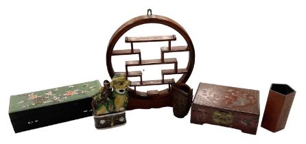 A modern Chinese hardwood circular wall hanging stand, height 30cm, width 27cm, a floral decorated