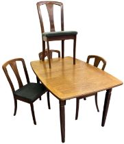 MEREDEW; a mid century teak extending dining table, 130 x 88cm, together with a set of four matching