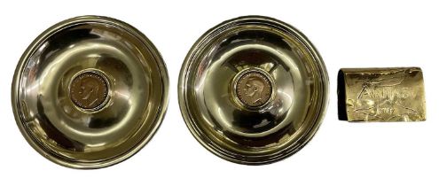 TRENCH ART; a pair of pin dishes, each set with 1937 pennies, diameter 12cm, and a brass matchbox