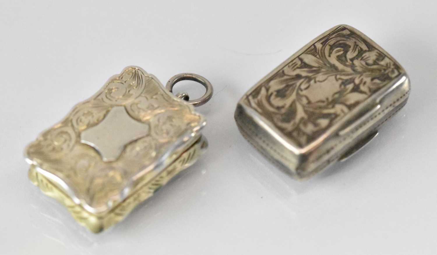 Two small Victorian hallmarked silver vinaigrettes, Birmingham 1840 and 1856, approx 2.5 x 1.5cm,