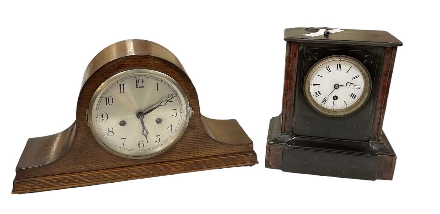 A Victorian slate mantel clock, the white enamel dial set with Roman numerals, height 24.5cm,