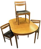 NATHAN FURNITURE; a teak mid century extending dining table, 151 x 95cm, together with four chairs.
