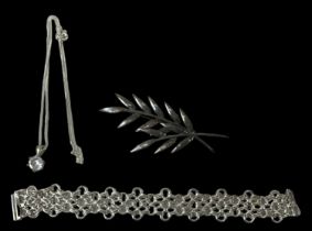A Danish sterling silver brooch modelled as a leaf, a 925 hallmarked silver bracelet and a silver