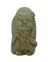 A green carved green hardstone figure of Shou Lao, height 4cm.