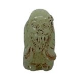 A green carved green hardstone figure of Shou Lao, height 4cm.