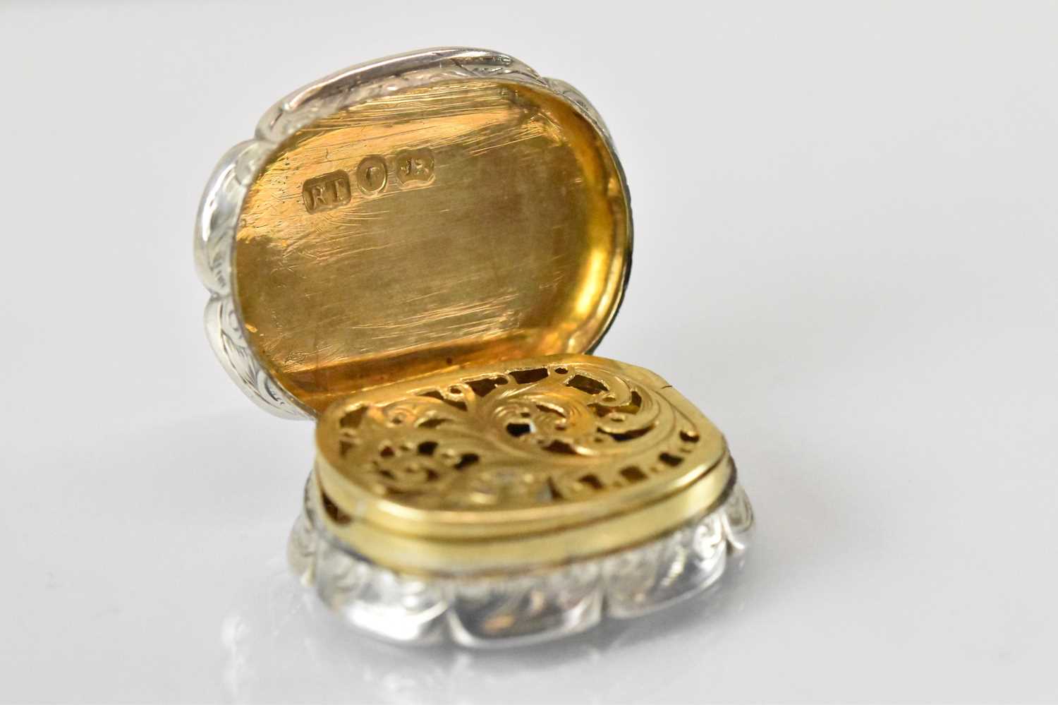 ROBERT THORNTON; a Victorian hallmarked silver shaped oval vinaigrette with gilt interior, - Image 2 of 4