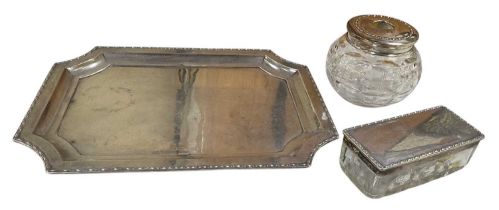 WALKER & HALL LTD; a George V hallmarked silver dressing table set, the tray hallmarked for