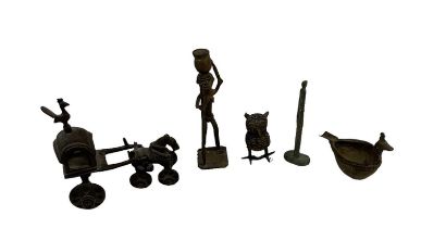 A Benin type bronze of a figure from Ghana carrying a pot on their head, height 14cm, a small