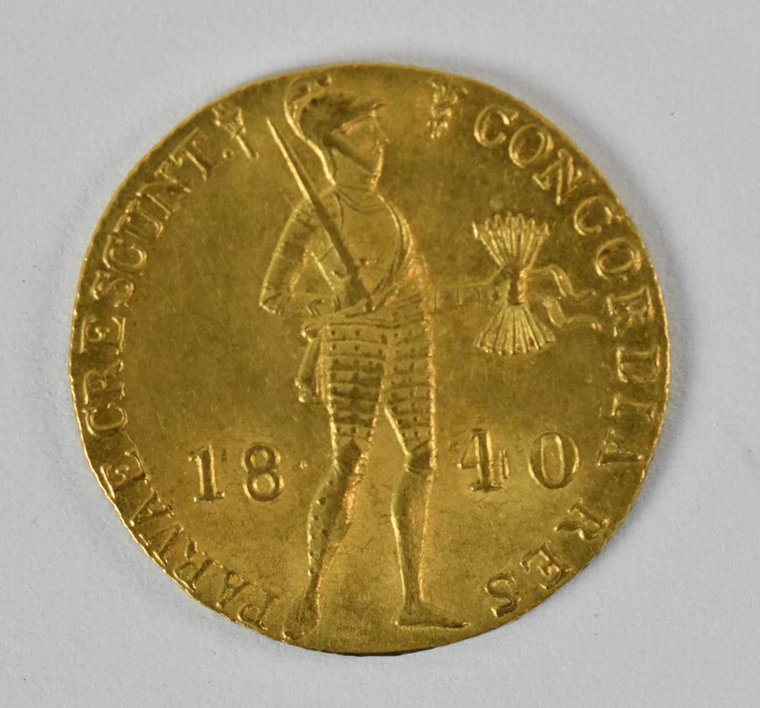 A Dutch one dukat gold coin, 1840, diameter 1.8cm, approx 3.5g.