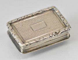 NATHANIEL MILLS; a small early Victorian hallmarked silver vinaigrette with pierced gilt interior,
