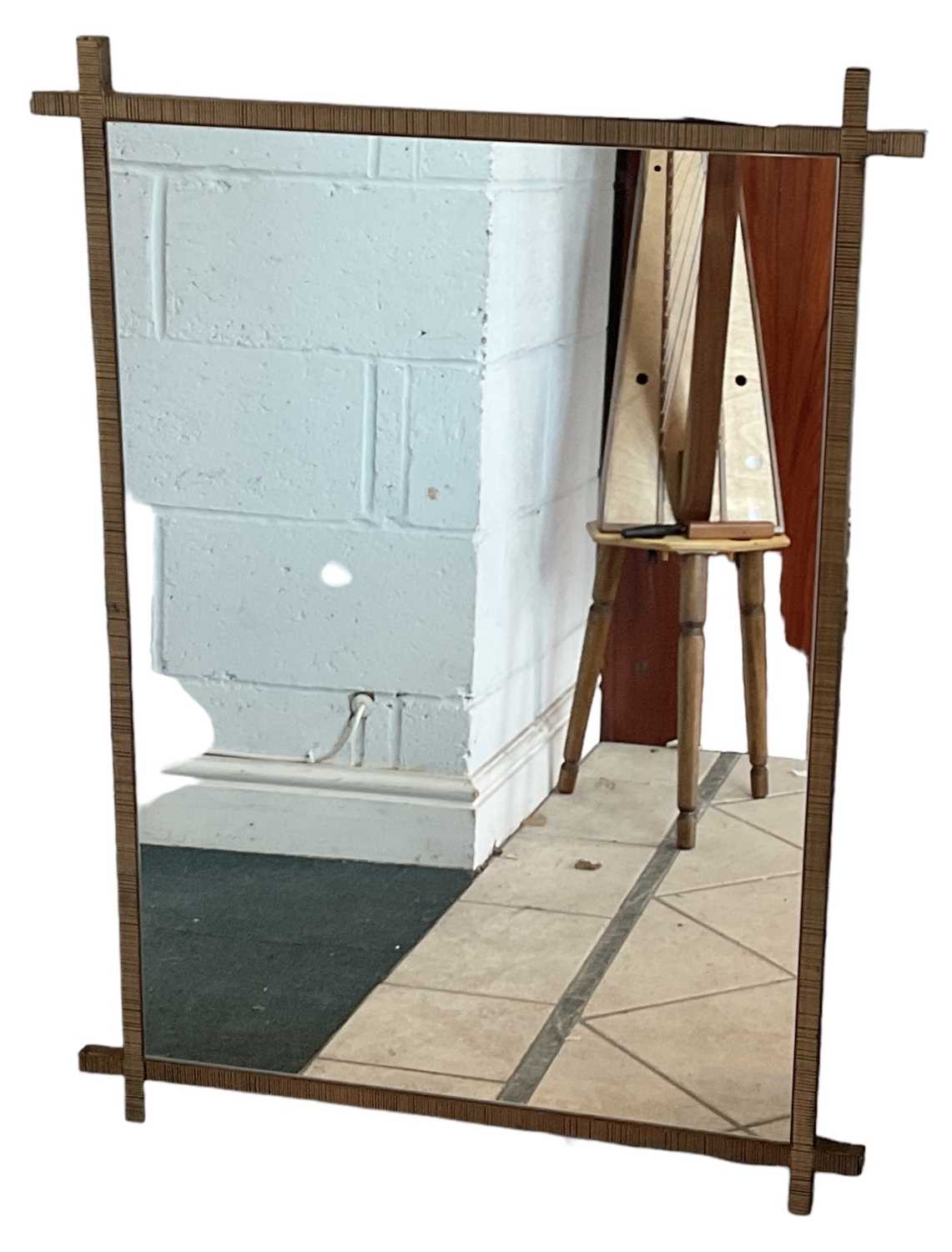 LIBRA; a modern gilt metal framed wall mirror, 76 x 103cm.