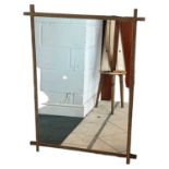 LIBRA; a modern gilt metal framed wall mirror, 76 x 103cm.