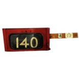 A vintage railway number box with front handle to change the numbers, width 49cm.