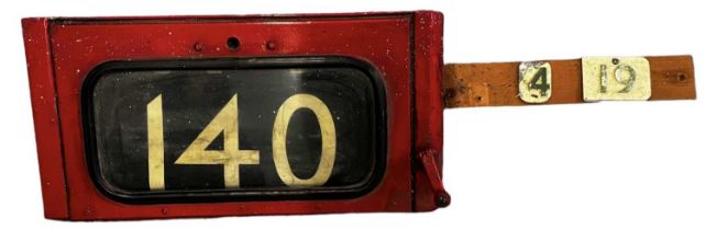 A vintage railway number box with front handle to change the numbers, width 49cm.
