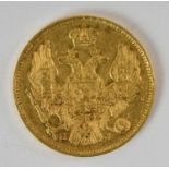 An 1838 Russian three ruble gold coin, diameter 1.8cm, approx 3.9g.