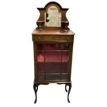 An early 20th century mahogany display cabinet with mirrored back, height 162cm, width 61cm.