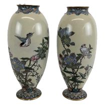 A pair of 19th century Chinese gilt metal and cloisonné enamel vases, decorated with swooping