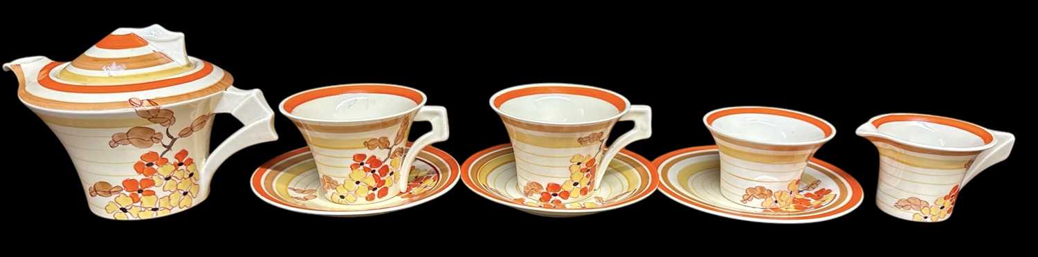 CLARICE CLIFF; a tea for two tea service decorated in the 'Hydrangea' pattern, comprising lidded