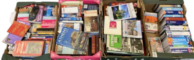 Four boxes of all world travel books.